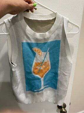 Women’s Never Worn Aperol Spritz Graphic White Sleeveless Sweater Vest, size L